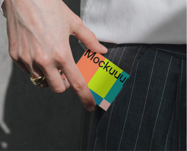 Business card mockup on surface with brand identity design from Figma