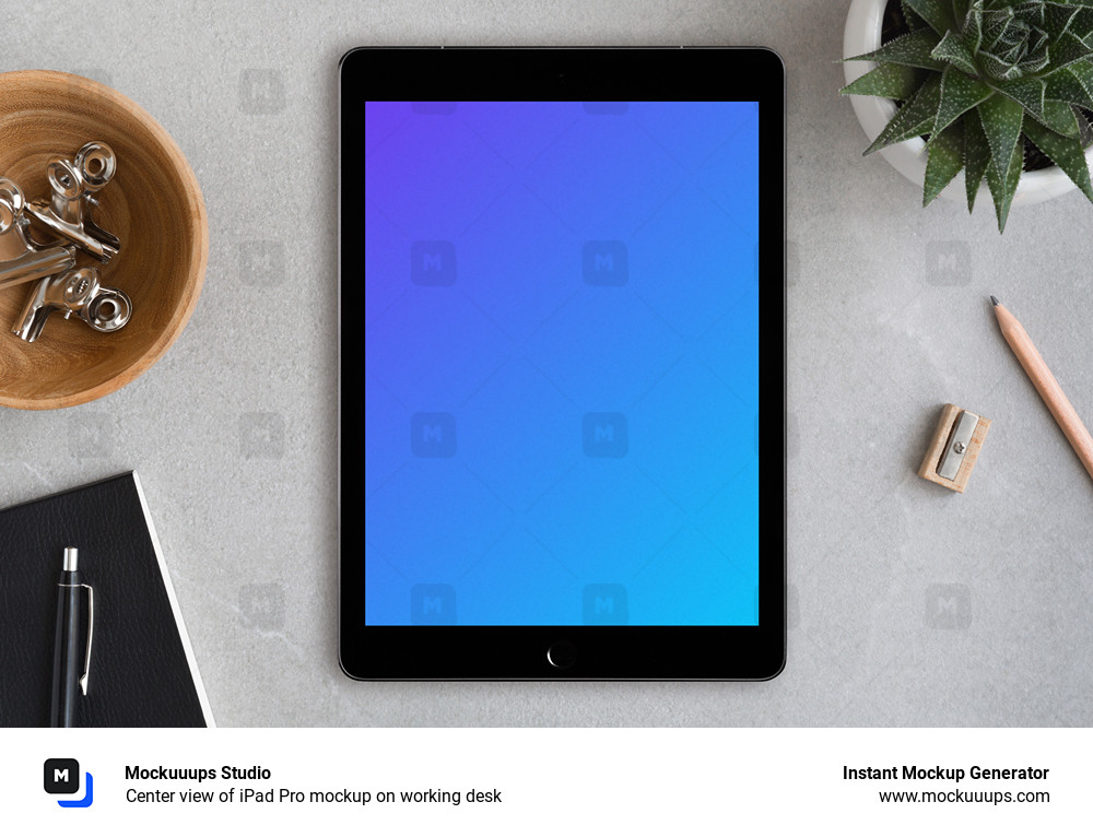 Download Center View Of Ipad Pro Mockup On Working Desk Mockuuups Studio