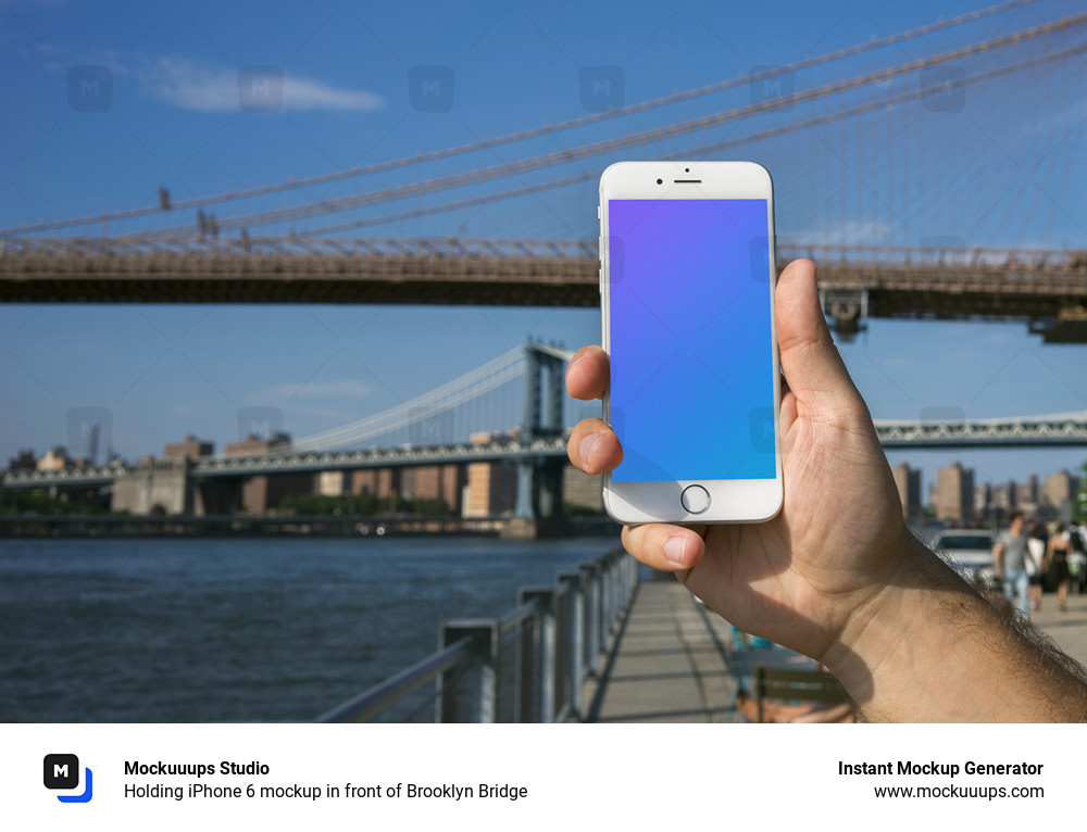 Download Holding Iphone 6 Mockup In Front Of Brooklyn Bridge Mockuuups Studio