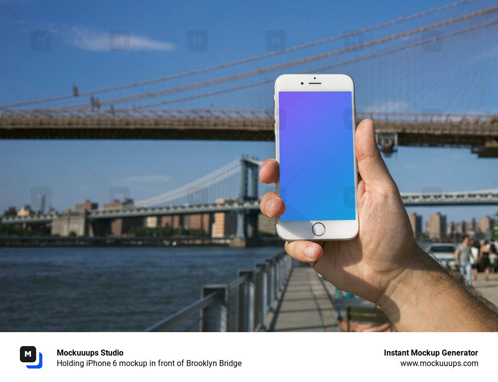 Holding Iphone 6 Mockup In Front Of Brooklyn Bridge Mockuuups Studio