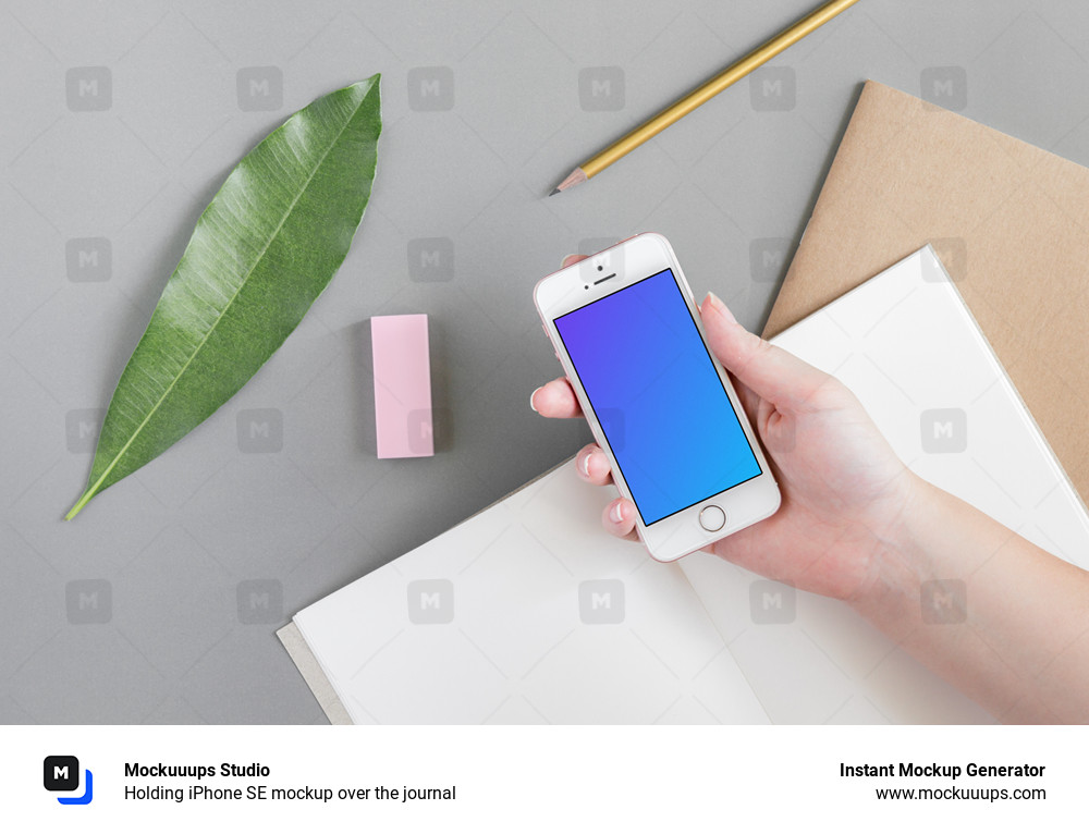 Download Holding Iphone Se Mockup Over The Journal Mockuuups Studio