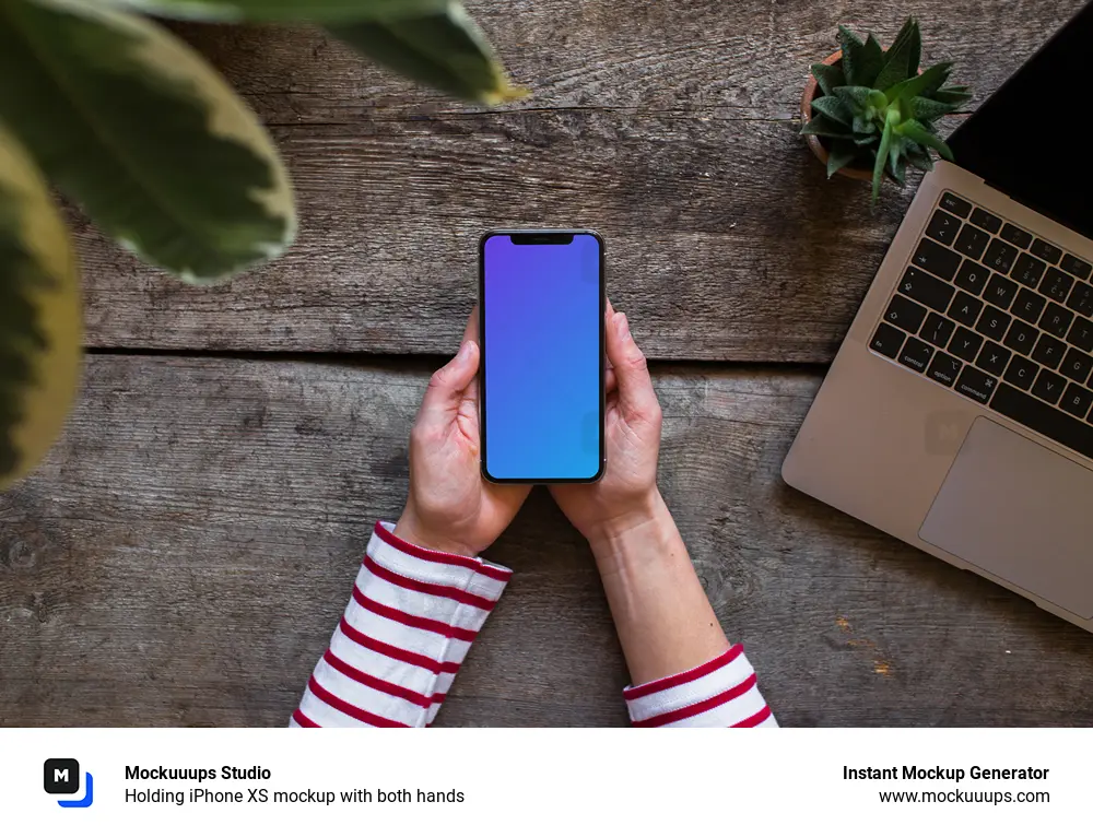 Download Holding iPhone XS mockup with both hands - Mockuuups Studio