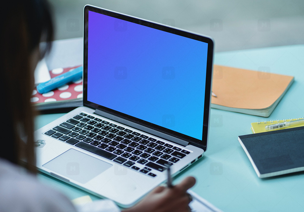 MacBook Pro mockup on an office desk