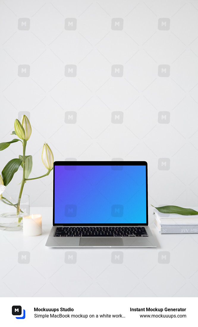 Simple MacBook mockup on a white workstation table with a plant at the side