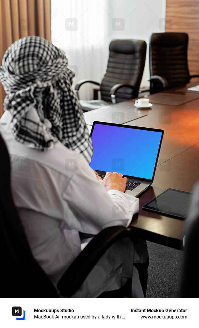 MacBook Air mockup used by a lady with a head covering
