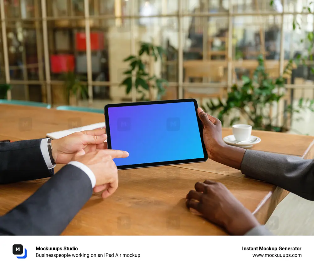 Businesspeople working on an iPad Air mockup