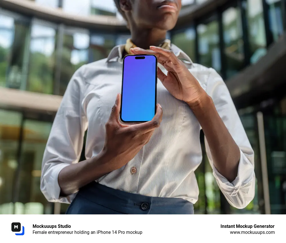 Female entrepreneur holding an iPhone 14 Pro mockup