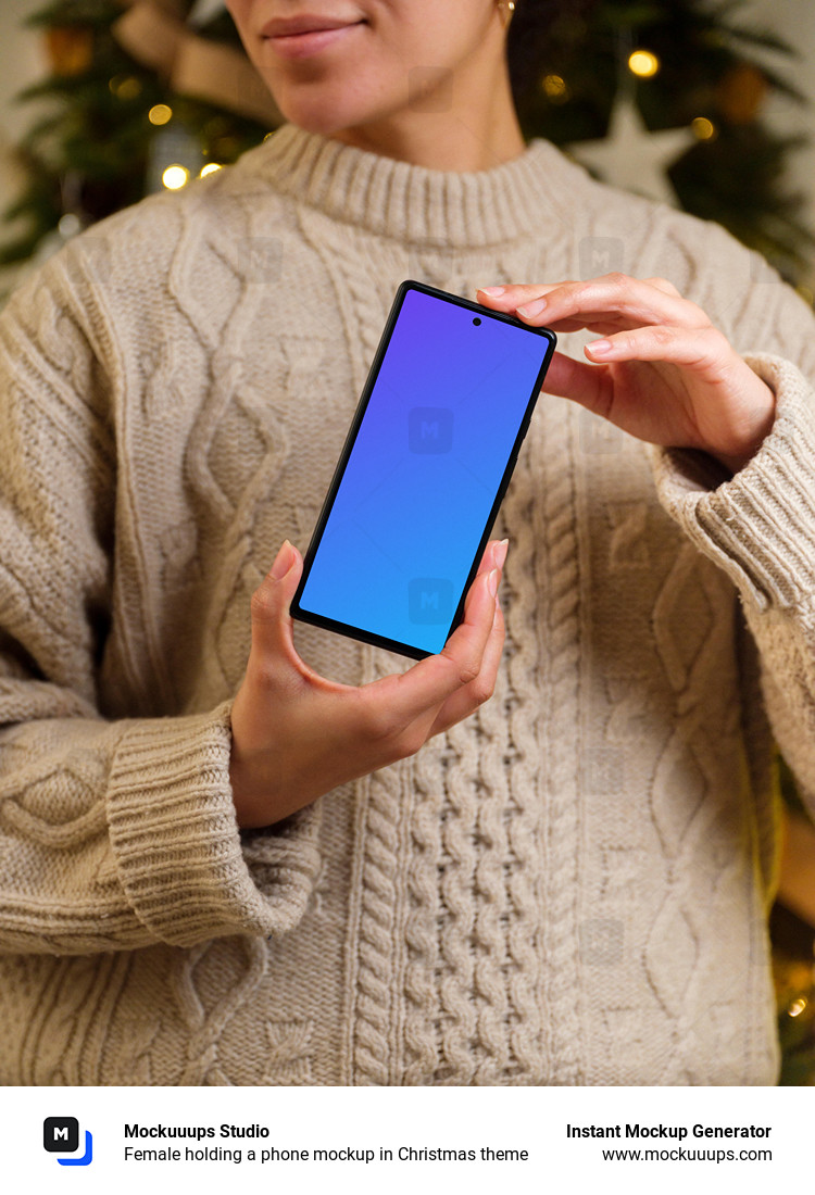 Female holding a phone mockup in Christmas theme