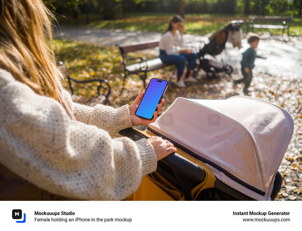 Female holding an iPhone in the park mockup