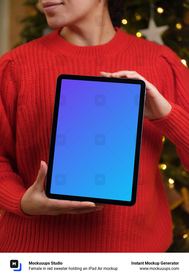 Female in red sweater holding an iPad Air mockup