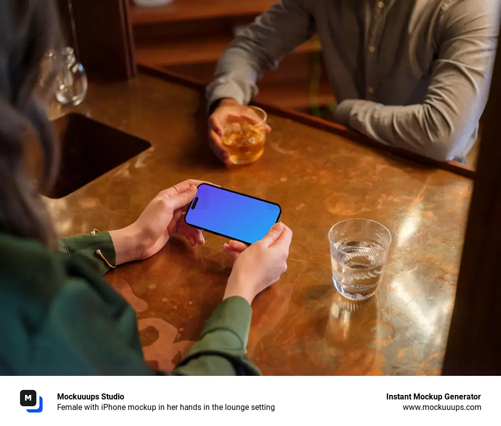 Female with iPhone mockup in her hands in the lounge setting