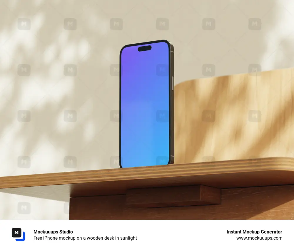 Free iPhone mockup on a wooden desk in sunlight