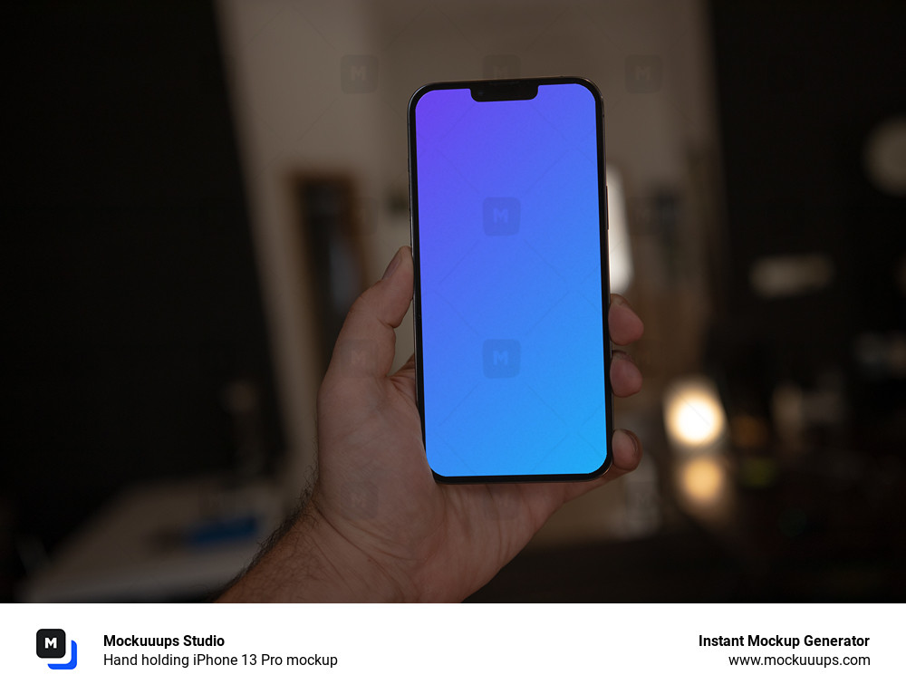 Hand holding iPhone 13 Pro mockup