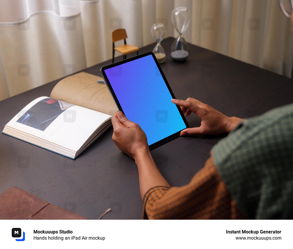 Hands holding an iPad Air mockup