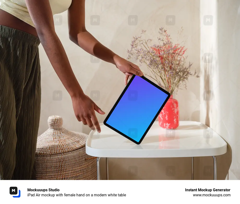 iPad Air mockup with female hand on a modern white table