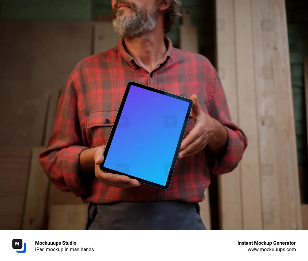 iPad mockup in man hands