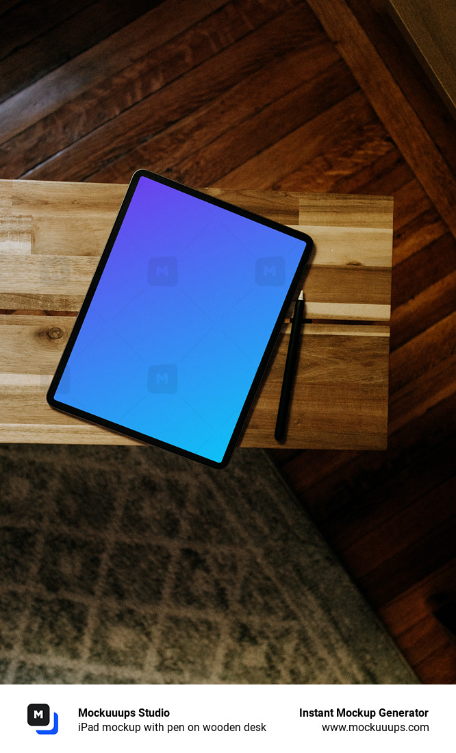 iPad mockup with pen on wooden desk