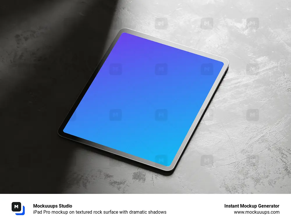 iPad Pro mockup on textured rock surface with dramatic shadows