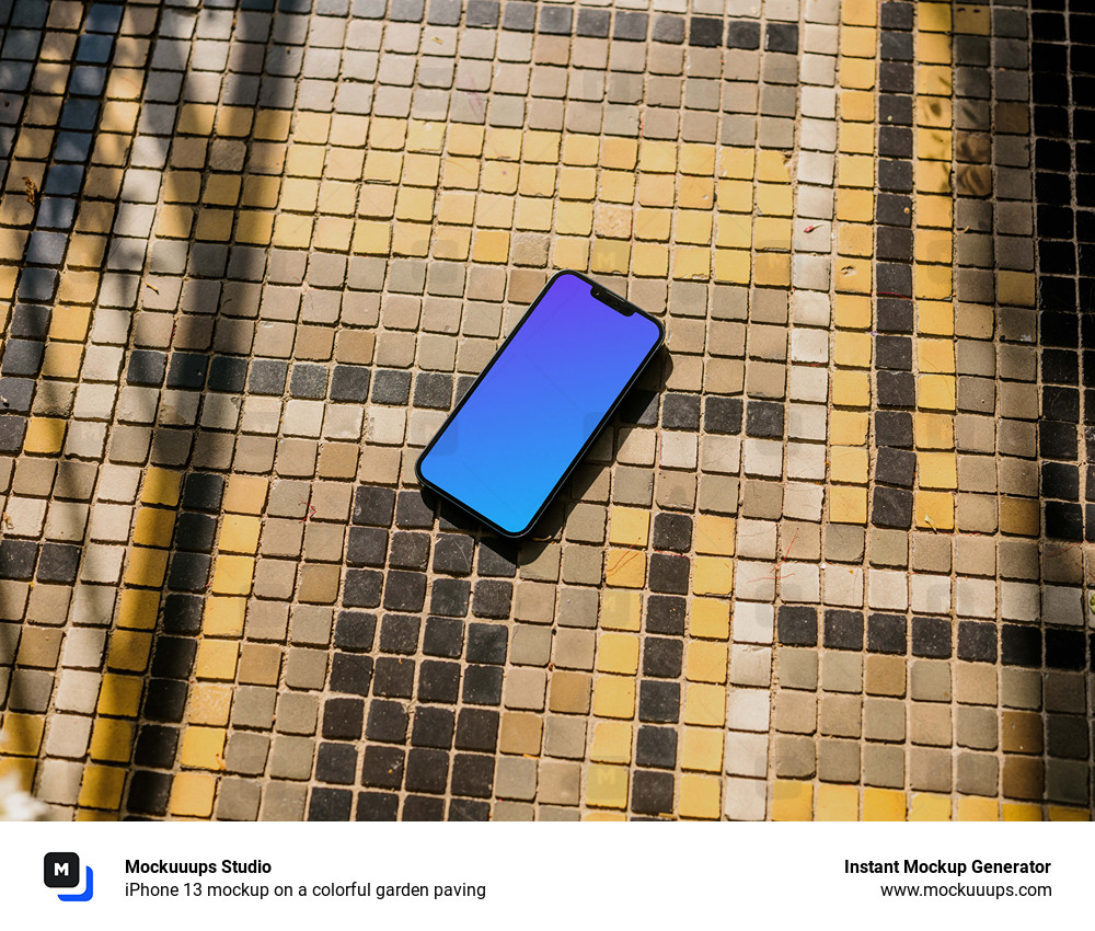 iPhone 13 mockup on a colorful garden paving