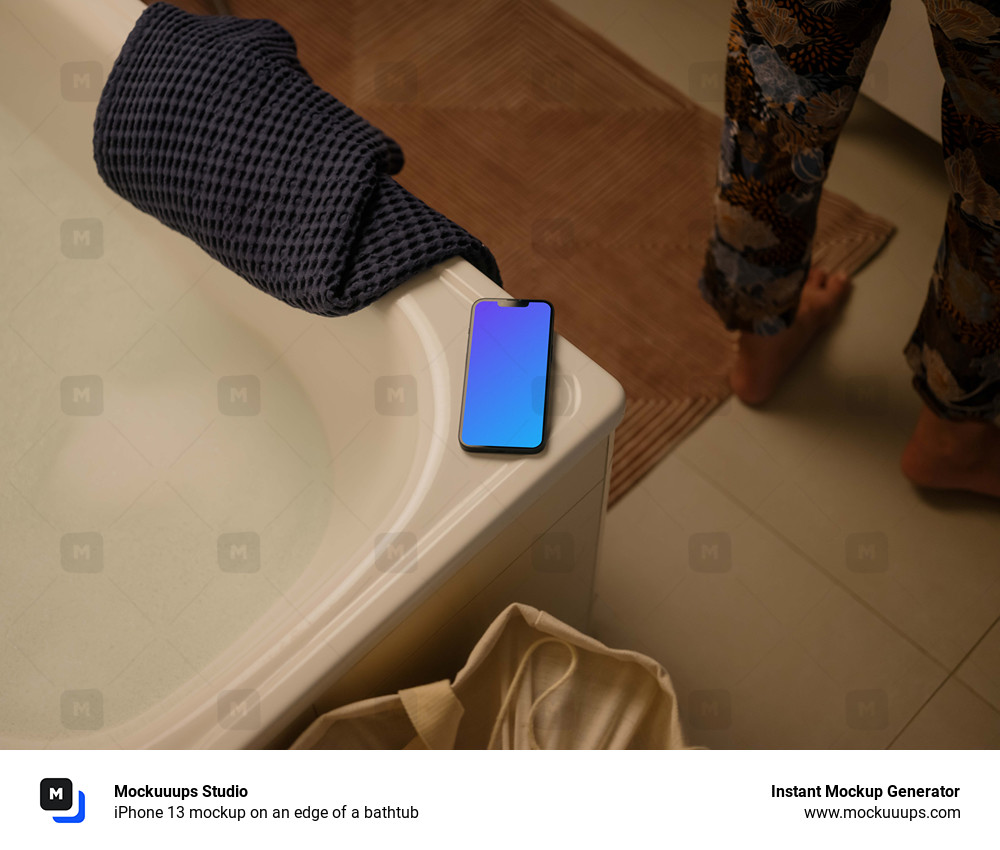 iPhone 13 mockup on an edge of a bathtub