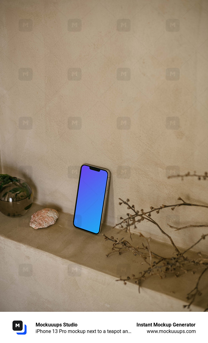 iPhone 13 Pro mockup next to a teapot and plant