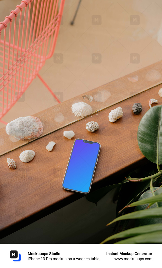 iPhone 13 Pro mockup on a wooden table next to seashells