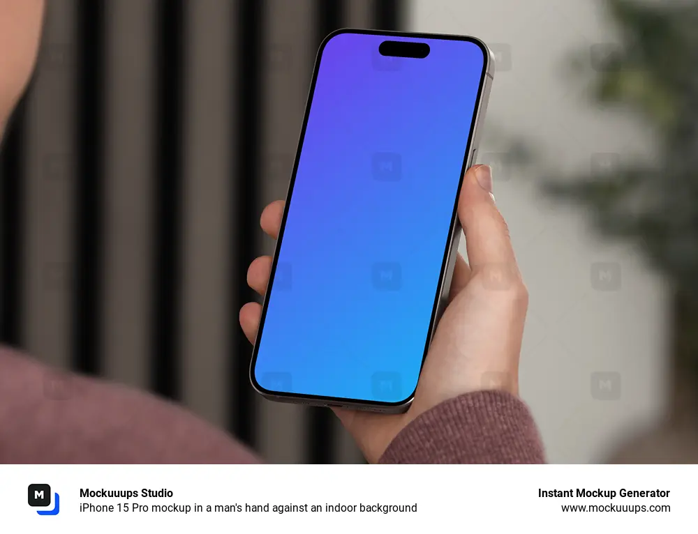 iPhone 15 Pro mockup in a man's hand against an indoor background