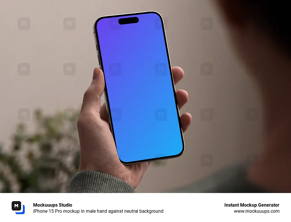 iPhone 15 Pro mockup in male hand against neutral background