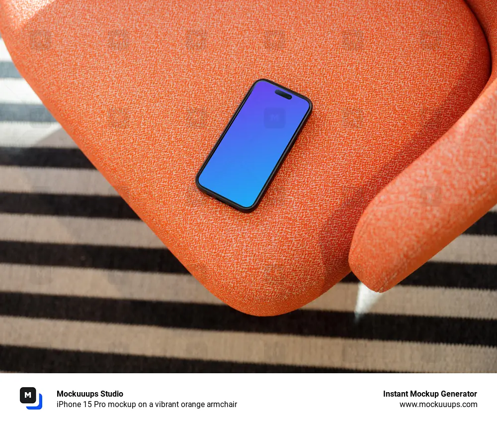 iPhone 15 Pro mockup on a vibrant orange armchair