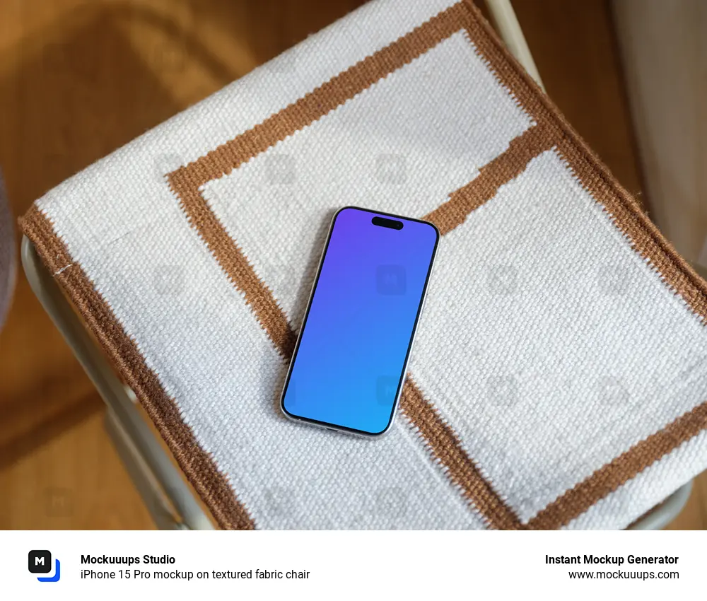 iPhone 15 Pro mockup on textured fabric chair