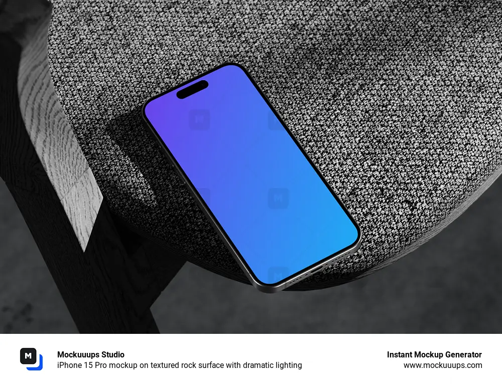 iPhone 15 Pro mockup on textured rock surface with dramatic lighting