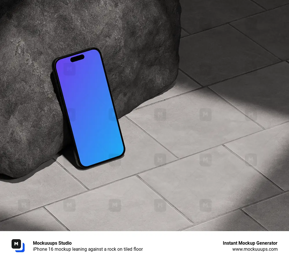 iPhone 16 mockup leaning against a rock on tiled floor