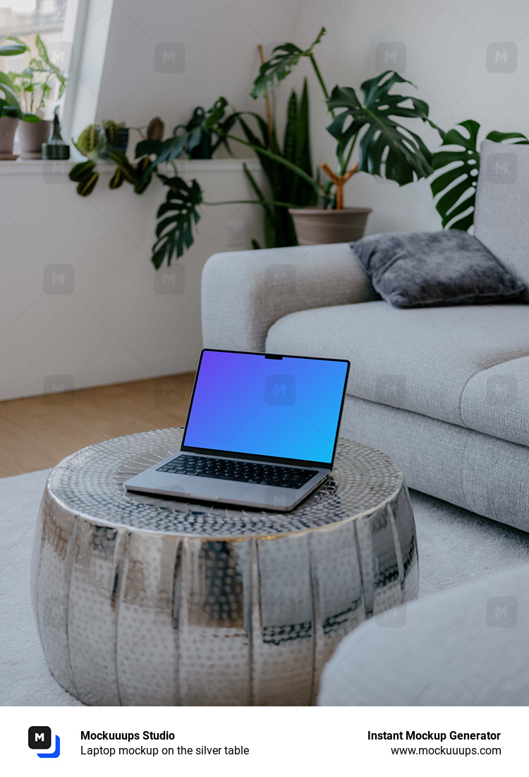 Laptop mockup on the silver table