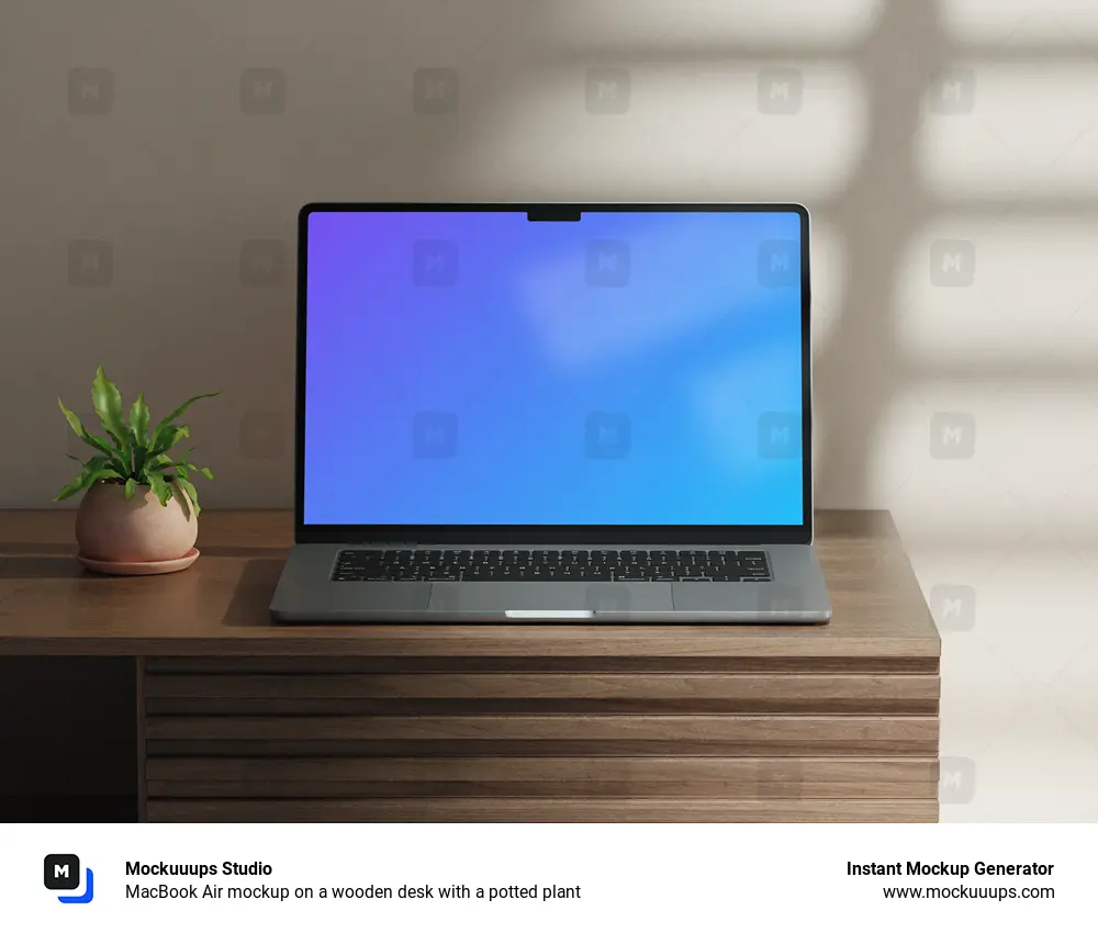 MacBook Air mockup on a wooden desk with a potted plant