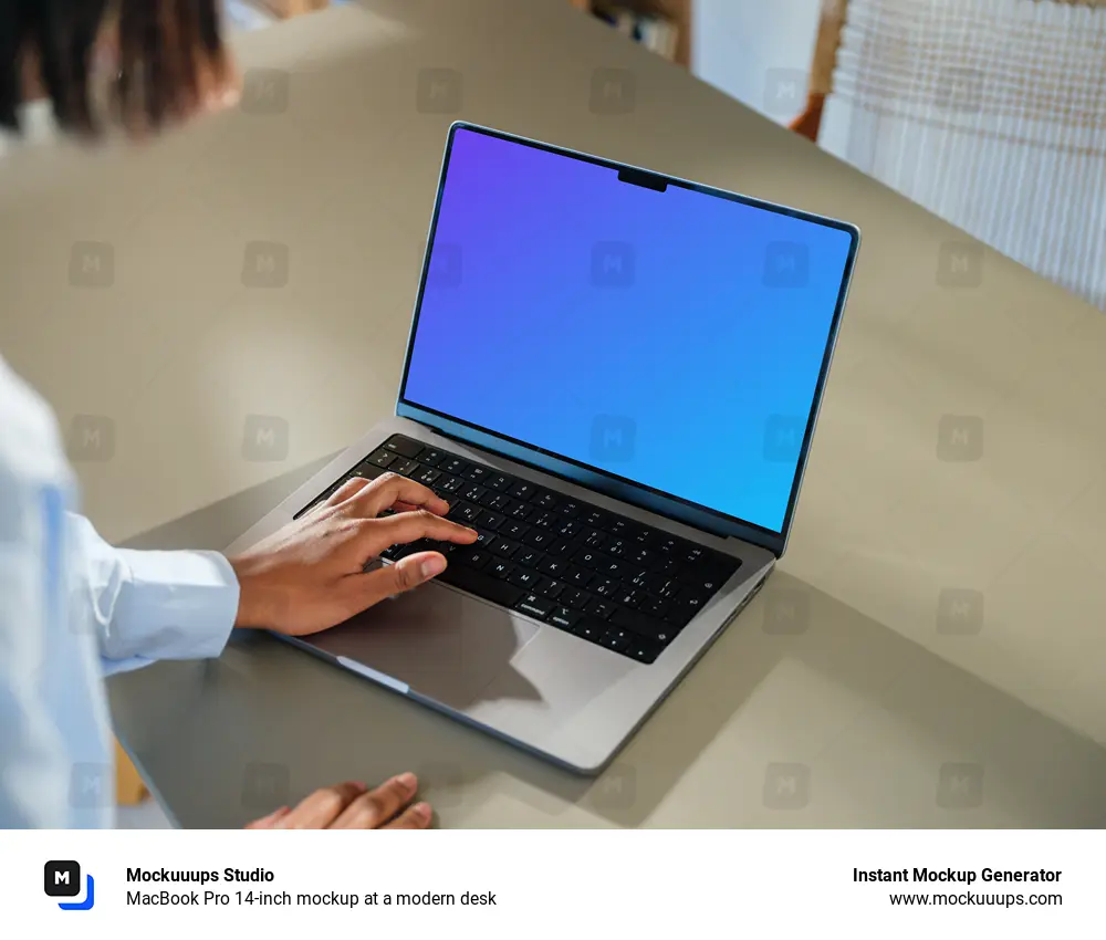 MacBook Pro 14-inch mockup at a modern desk