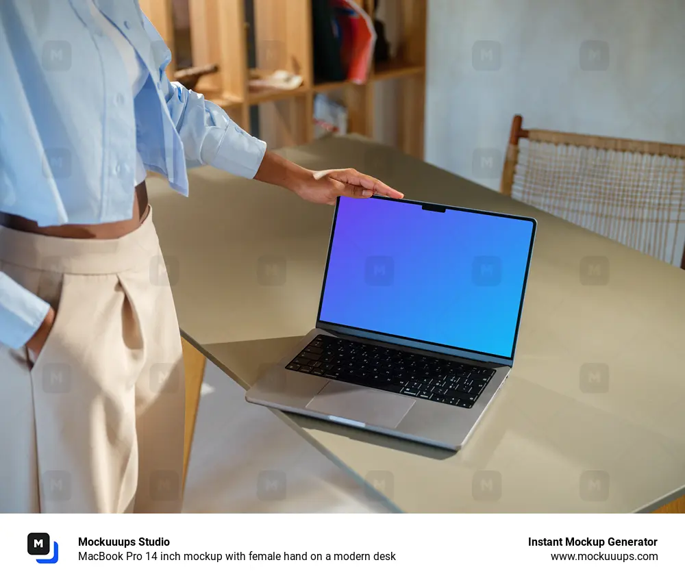 MacBook Pro 14 inch mockup with female hand on a modern desk