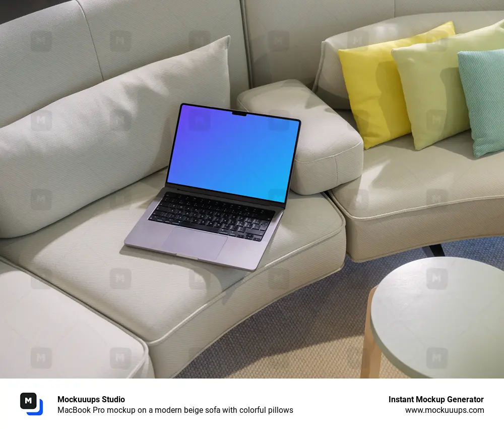 MacBook Pro mockup on a modern beige sofa with colorful pillows