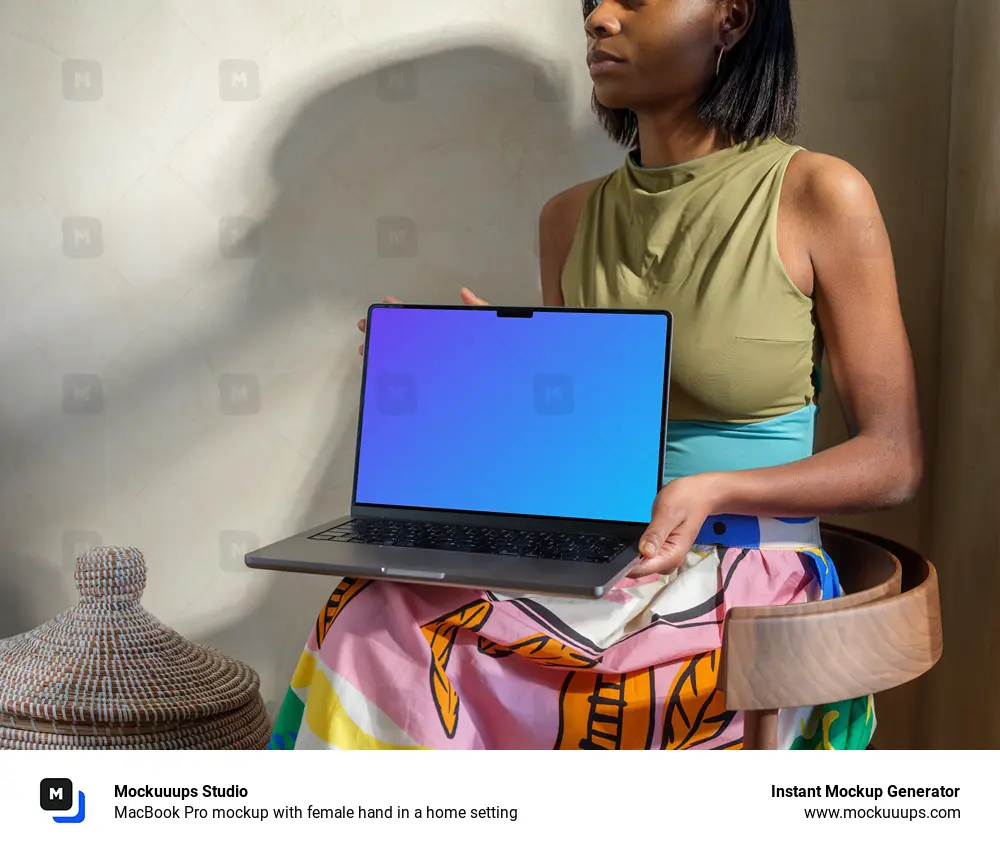 MacBook Pro mockup with female hand in a home setting