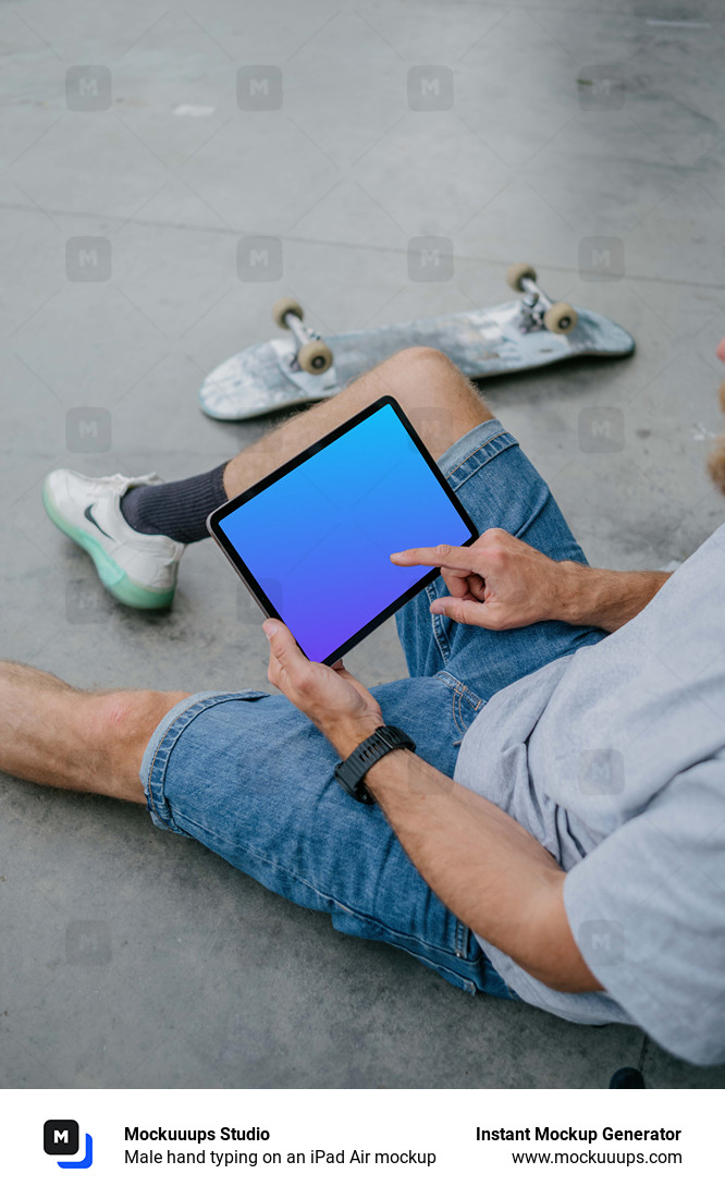 Male hand typing on an iPad Air mockup