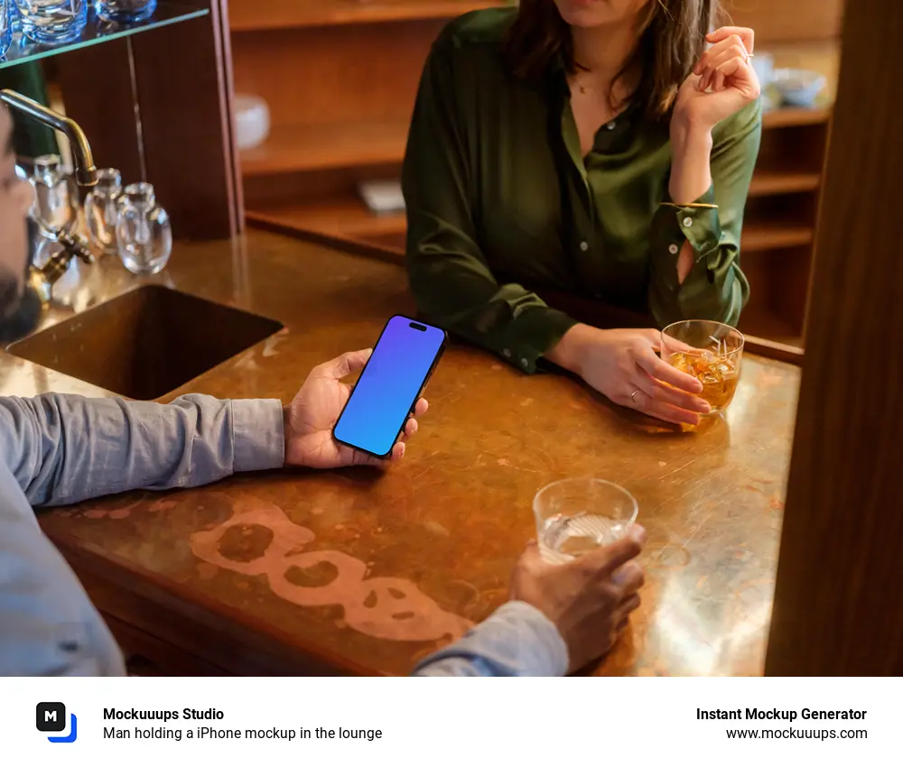 Man holding a iPhone mockup in the lounge