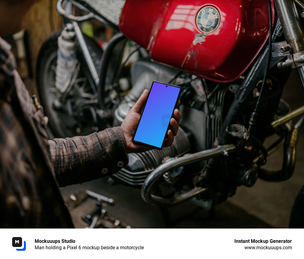 Man holding a Pixel 6 mockup beside a motorcycle