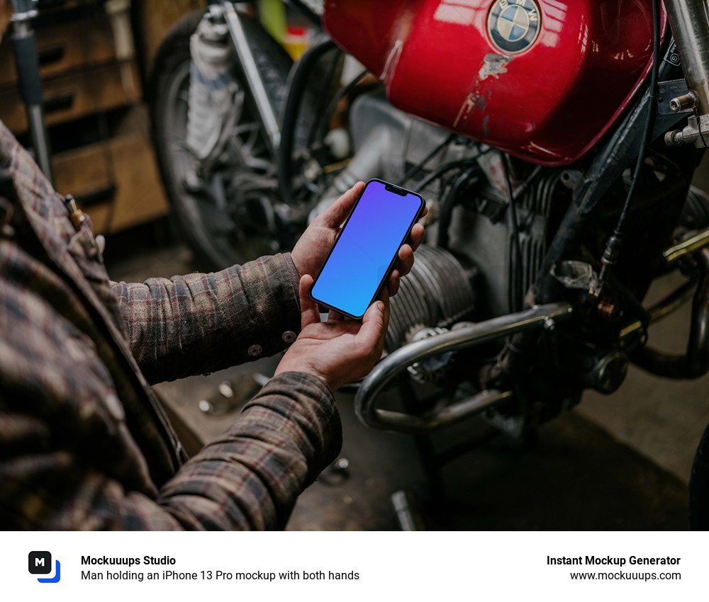 Man holding an iPhone 13 Pro mockup with both hands