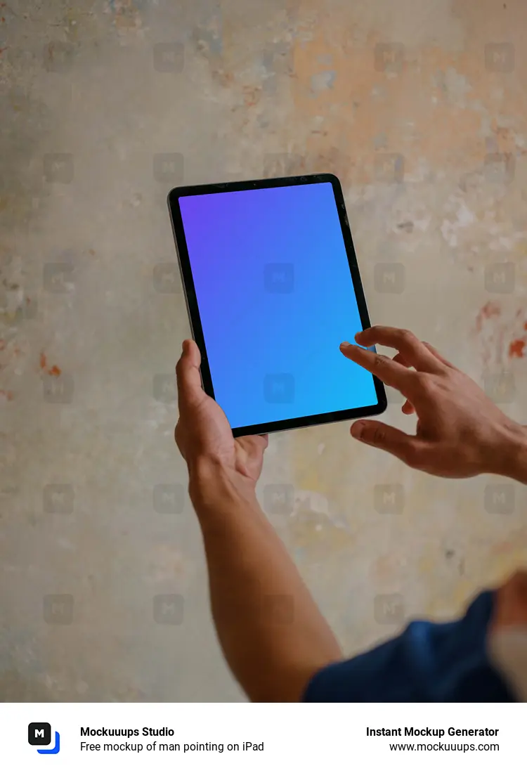 Free mockup of man pointing on iPad