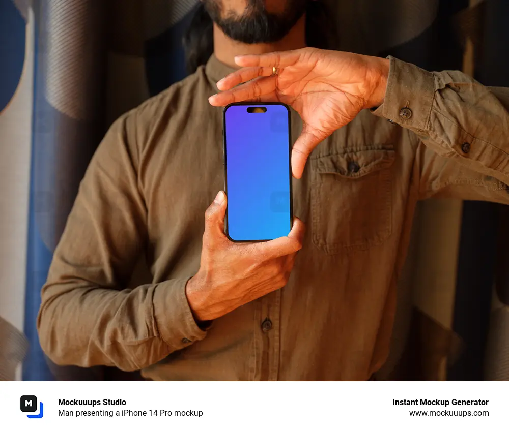 Man presenting a iPhone 14 Pro mockup