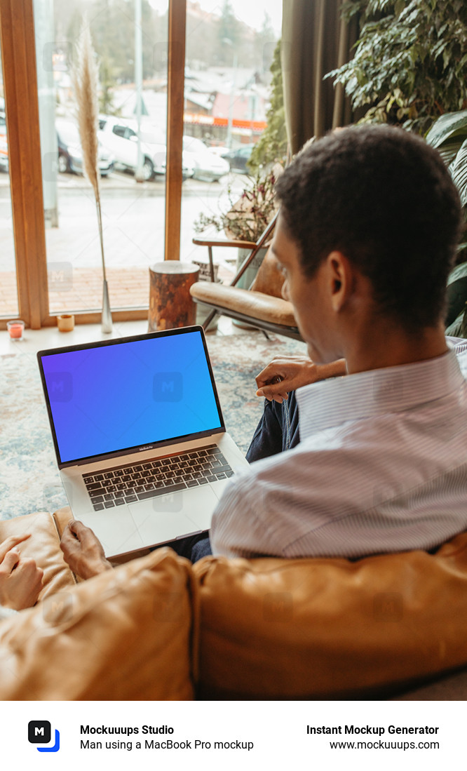 Man using a MacBook Pro mockup