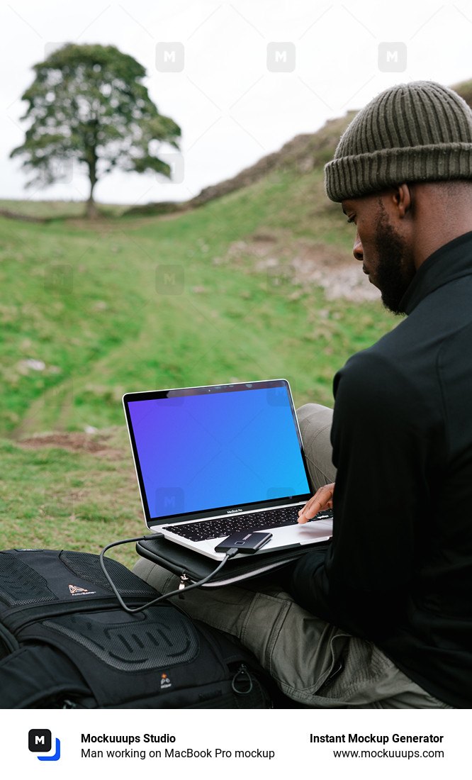 Man working on MacBook Pro mockup