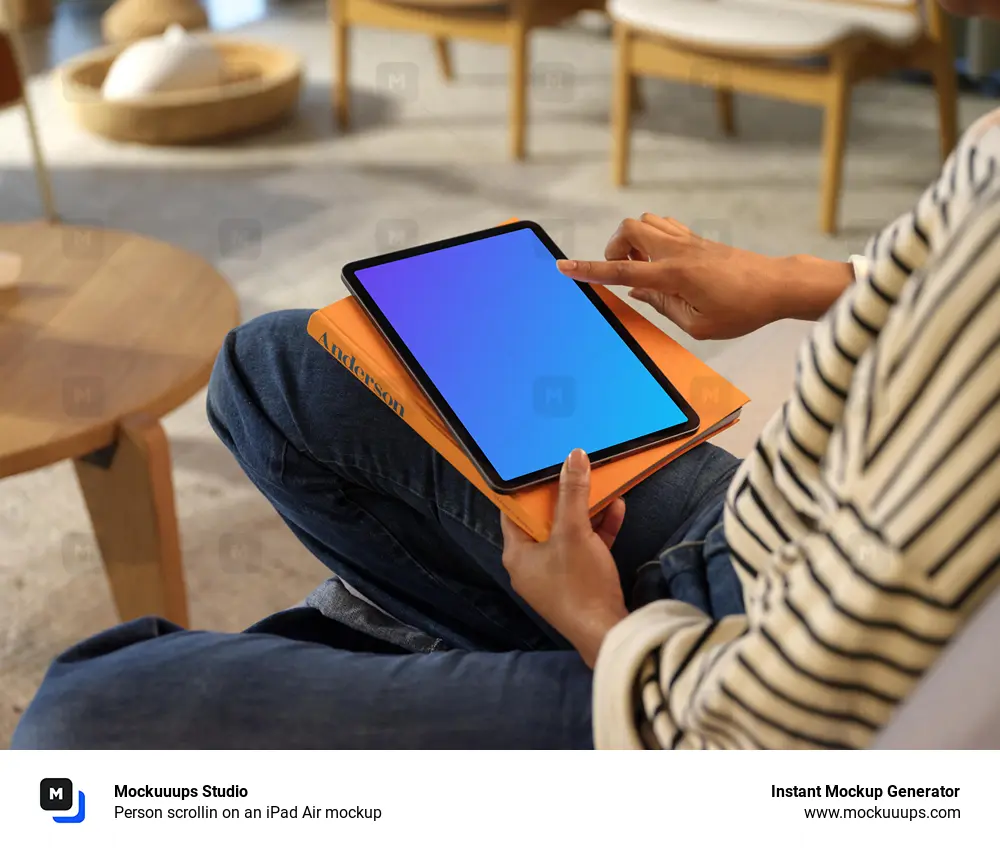 Person scrollin on an iPad Air mockup