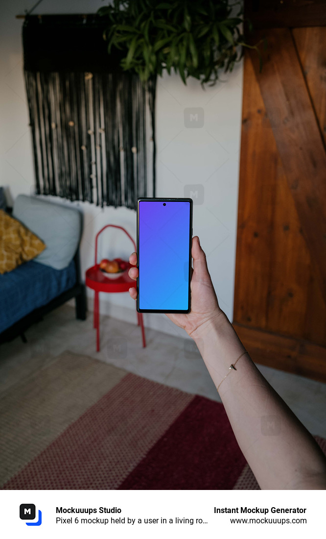 Pixel 6 mockup held by a user in a living room