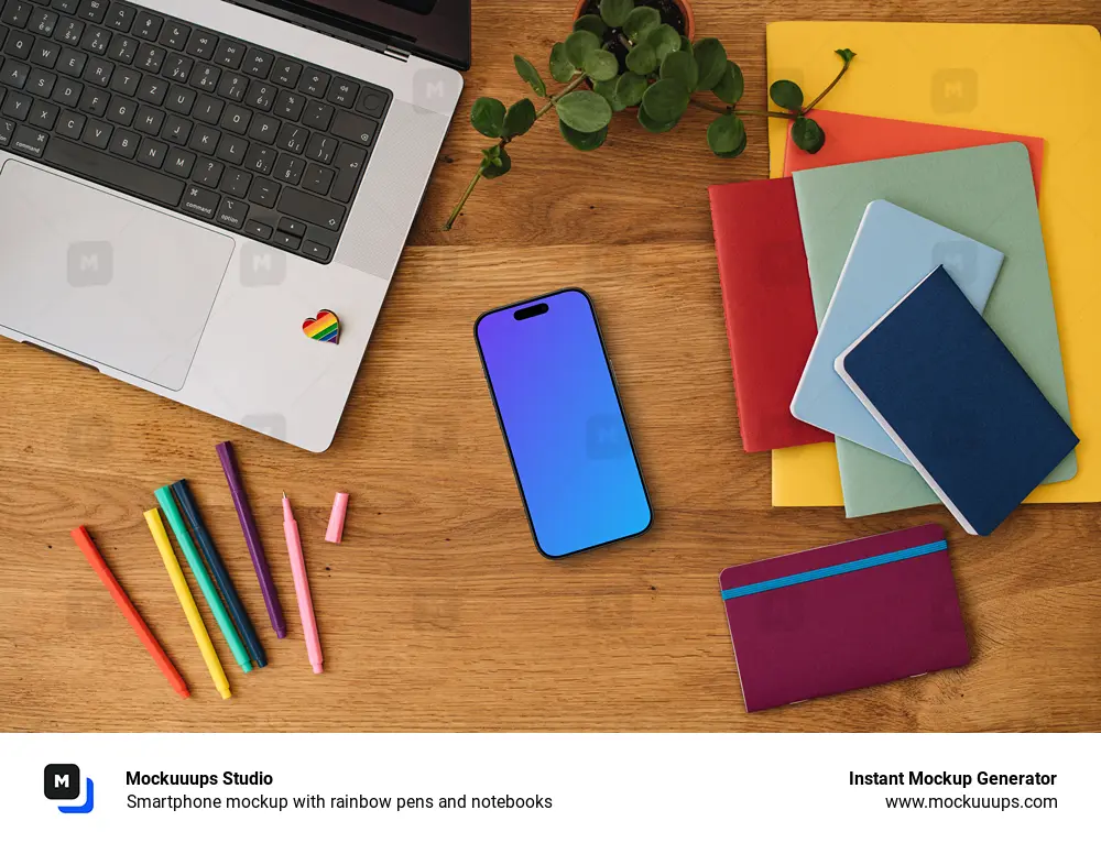 Smartphone mockup with rainbow pens and notebooks