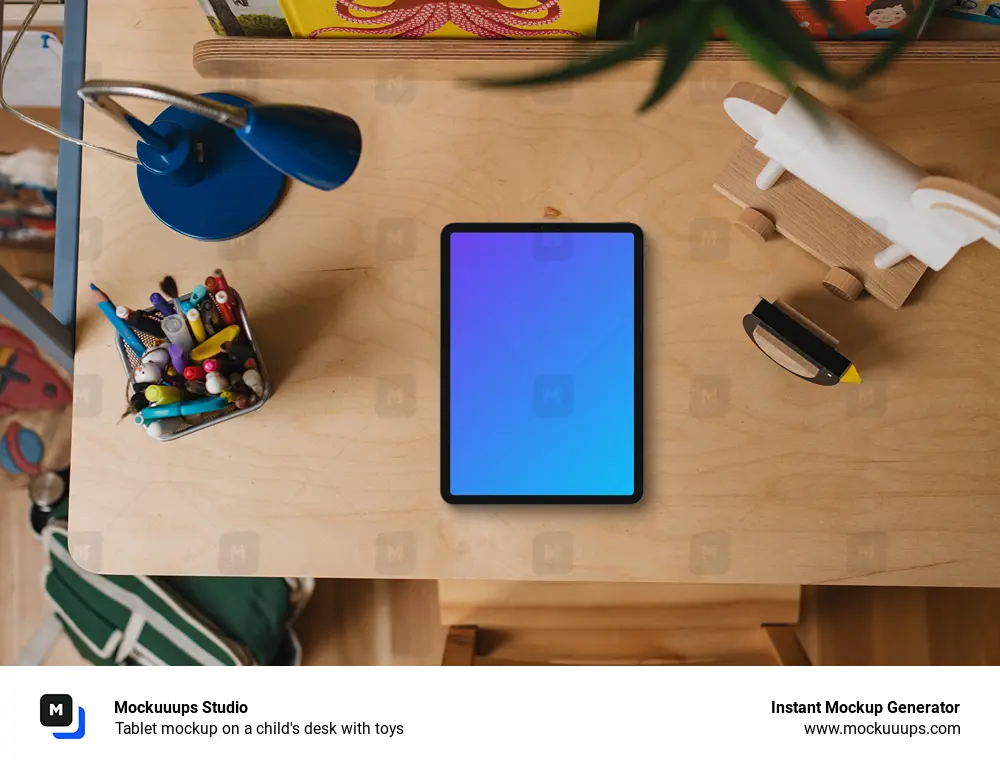 Tablet mockup on a child's desk with toys